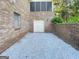 Long gravel driveway leading to a one car garage underneath screened porch at 120 Rolling Brook Trl, Fayetteville, GA 30215