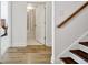 Bright hallway with wood floors leading to a bathroom with a shower-tub combo and a bedroom at 82 Airmont Dr, Sharpsburg, GA 30277