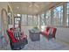 This is a beautiful outdoor space with seating, decor, and lots of natural light at 82 Airmont Dr, Sharpsburg, GA 30277