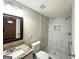 Nicely remodeled bathroom with a granite vanity and tiled shower with a built-in niche at 2229 Sharon Way, Decatur, GA 30032