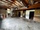 Unfinished basement with exposed beams, offering a blank canvas for creating additional living space at 1504 Colt Ridge Se Ln, Mableton, GA 30126