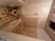 Outdated bathroom featuring a tub, toilet, and classic tile at 1504 Colt Ridge Se Ln, Mableton, GA 30126
