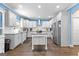 Spacious kitchen with stainless steel appliances, granite countertops and a large kitchen island at 105 Turnberry Trce, Sharpsburg, GA 30277