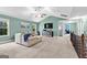 Spacious living room features vaulted ceiling, large windows and comfortable seating for relaxing and enjoying entertainment at 105 Turnberry Trce, Sharpsburg, GA 30277