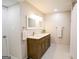 Updated bathroom features a double sink vanity with granite countertops, and updated fixtures at 170 River Forest Dr, Fayetteville, GA 30214