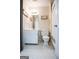 Compact bathroom with a white vanity, toilet, and shower, designed for functionality at 170 River Forest Dr, Fayetteville, GA 30214