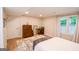 Bright bedroom with wood floors and a lovely view of nature from the large window at 170 River Forest Dr, Fayetteville, GA 30214
