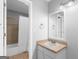 This bathroom features tile flooring, single sink vanity and shower/tub combo at 53 Cobblestone Crk, Peachtree City, GA 30269