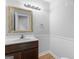 Bathroom with a new vanity and mirror at 53 Cobblestone Crk, Peachtree City, GA 30269