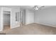 This spacious bedroom features neutral carpet, ceiling fan and ample closet space at 53 Cobblestone Crk, Peachtree City, GA 30269