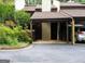 Townhome with a covered carport and well-maintained landscaping at 53 Cobblestone Crk, Peachtree City, GA 30269