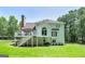 Exterior view of home with a deck, patio, grill area, and large windows at 20 Allie Dr, Mcdonough, GA 30252