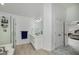 Bathroom featuring a glass shower, vanity with generous counter space, and access to the bedroom at 20 Allie Dr, Mcdonough, GA 30252