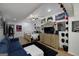 Large bedroom featuring modern furniture, TV, wall decor, and ample natural light at 20 Allie Dr, Mcdonough, GA 30252
