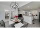 Bright dining area with chandelier, open to the kitchen and Gathering room at 20 Allie Dr, Mcdonough, GA 30252