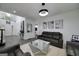 Inviting living room with modern decor, gray sofas and stylish mirrored coffee table at 20 Allie Dr, Mcdonough, GA 30252