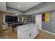 Recreational area with kitchen island, game tables, and TV, perfect for entertaining and leisure at 20 Allie Dr, Mcdonough, GA 30252