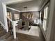 Elegant dining room with a modern chandelier and plantation shutters at 1122 Montclair Dr, Peachtree City, GA 30269