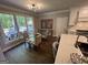 Bright eat-in kitchen with large windows and outdoor views at 1122 Montclair Dr, Peachtree City, GA 30269