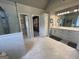 This main bathroom features a separate shower and a door leading into a walk in closet at 1122 Montclair Dr, Peachtree City, GA 30269