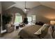 This expansive main bedroom offers vaulted ceilings, lots of light, and an attached sitting area at 1122 Montclair Dr, Peachtree City, GA 30269