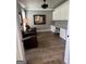 Home office featuring a built-in desk, ample storage and hardwood floors at 1122 Montclair Dr, Peachtree City, GA 30269