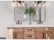 This primary bathroom features a double vanity with modern fixtures and updated lighting at 2018 Presley, Atlanta, GA 30317