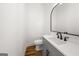 This bathroom includes a sleek vanity with a white countertop and modern fixtures at 2018 Presley, Atlanta, GA 30317
