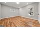 Well-lit bedroom with hardwood floors, a window, fresh paint and modern trim at 2018 Presley, Atlanta, GA 30317