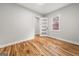 This bedroom offers hardwood floors, neutral paint, modern trim and plenty of natural light at 2018 Presley, Atlanta, GA 30317