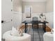 Bright office featuring a black desk, modern chair, and light-colored walls and trim at 2018 Presley, Atlanta, GA 30317