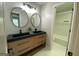 Stylish double vanity bathroom featuring vessel sinks, modern fixtures, and tiled shower at 219 Maple Creek Chase, Woodstock, GA 30188