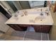 Bathroom features a double sink vanity with tiled floors, a jacuzzi tub and a large mirror at 3008 Brighton Ct, Conyers, GA 30094