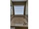 Bright bathroom with tile-surround tub, and a window providing natural light at 3008 Brighton Ct, Conyers, GA 30094