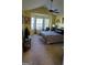 Bedroom with a ceiling fan and natural light from the bay windows and decorated in a stylish manner at 3008 Brighton Ct, Conyers, GA 30094
