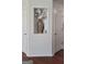 Decorative niche with flowers in the foyer adds a personal touch to the entryway at 3008 Brighton Ct, Conyers, GA 30094