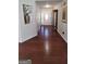 Inviting foyer with hardwood floors, decorative niche, and a welcoming front door at 3008 Brighton Ct, Conyers, GA 30094