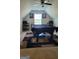 Game room features a pool table, a ceiling fan and bar stools; great for entertaining guests at 3008 Brighton Ct, Conyers, GA 30094