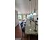 Open kitchen featuring granite countertops, modern lighting fixtures, and a breakfast bar with seating at 3008 Brighton Ct, Conyers, GA 30094