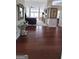 Open concept living room with hardwood floors and stylish decor, creating an inviting atmosphere at 3008 Brighton Ct, Conyers, GA 30094