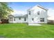 Large backyard with green grass and a patio, perfect for outdoor gatherings and relaxation at 3587 Oakvale Ave, Decatur, GA 30034