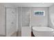 Modern bathroom with elegant soaking tub, shower, and fixtures at 107 Cedar Brook Dr, Canton, GA 30115