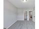 Bedroom featuring neutral walls and carpet, and doors that lead to closets and other rooms at 107 Cedar Brook Dr, Canton, GA 30115
