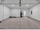 Spacious two car garage with overhead door and access door to the interior at 107 Cedar Brook Dr, Canton, GA 30115
