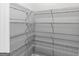 Walk-in pantry with adjustable wire shelving provides ample storage space at 107 Cedar Brook Dr, Canton, GA 30115