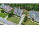 A beautiful lawn with meticulous landscaping compliments this brick home at 2750 Brentwood Estates Ct, Cumming, GA 30041