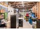 Unfinished basement with exposed ceiling beams and storage items at 2750 Brentwood Estates Ct, Cumming, GA 30041