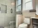 Modern bathroom featuring glass shower, stylish tilework, and contemporary fixtures at 2750 Brentwood Estates Ct, Cumming, GA 30041