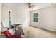 Unfurnished bedroom featuring carpet floors, ceiling fan, and window allowing ample natural light at 2750 Brentwood Estates Ct, Cumming, GA 30041