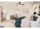 Spacious main bedroom features a ceiling fan and access to an en-suite bathroom at 2750 Brentwood Estates Ct, Cumming, GA 30041